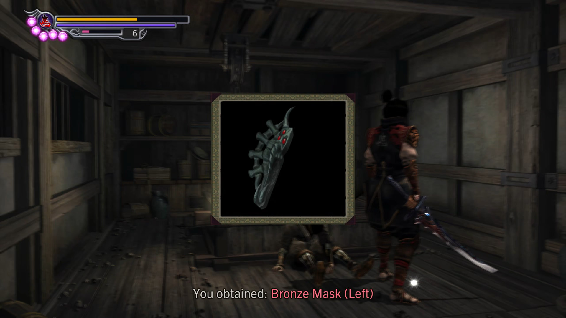 110. Bronze Mask (Left)